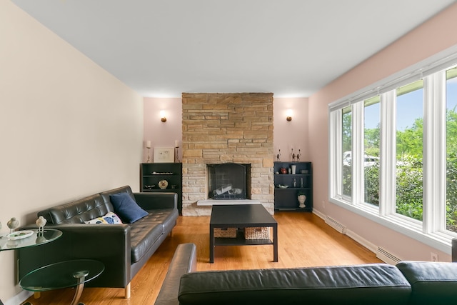 464 Northgate Ct, Riverside, IL 60546 - living room featuring a baseboard heating unit, wood finished floors, and a fireplace
