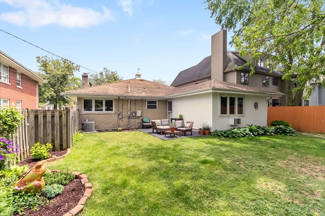 464 Northgate Ct, Riverside, IL 60546 - rear view of property featuring an outdoor hangout area, central AC, a patio, and a chimney