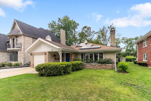 464 Northgate Ct, Riverside, IL 60546 - view of front of house with driveway, roof mounted solar panels, an attached garage, a front lawn, and stone siding