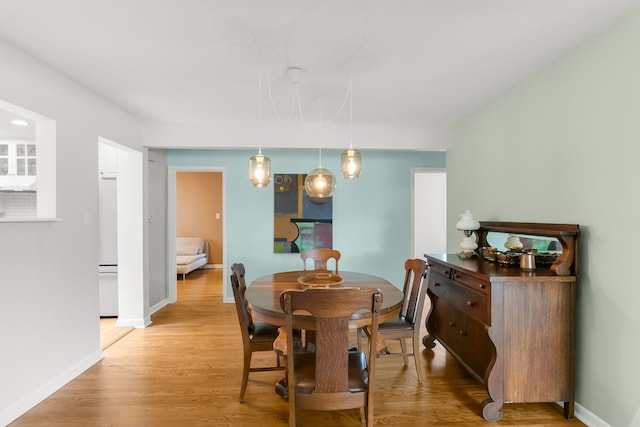 464 Northgate Ct, Riverside, IL 60546 - dining room with baseboards and light wood finished floors