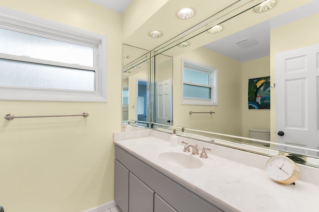 464 Northgate Ct, Riverside, IL 60546 - bathroom with vanity, toilet, and baseboards