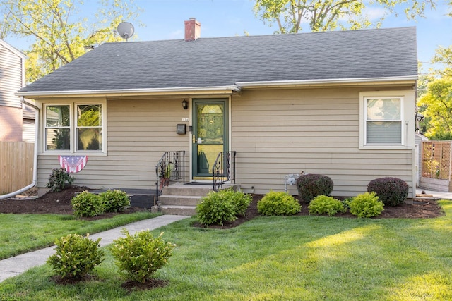 124 N W End Ave, Westmont, IL 60559 - view of front of home featuring roof with shingles and a chimney