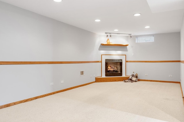 124 N W End Ave, Westmont, IL 60559 - below grade area with carpet flooring, recessed lighting, a lit fireplace, and baseboards