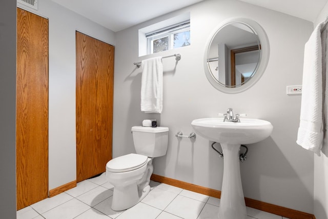 124 N W End Ave, Westmont, IL 60559 - bathroom featuring toilet and baseboards