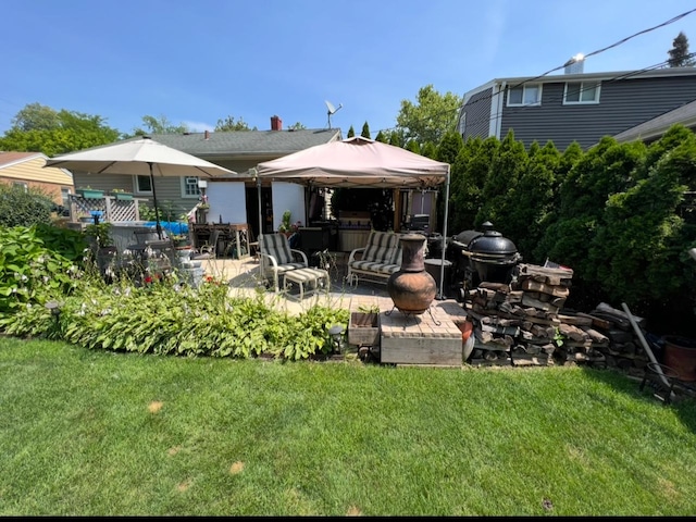 124 N W End Ave, Westmont, IL 60559 - rear view of house with a gazebo, a yard, and a patio