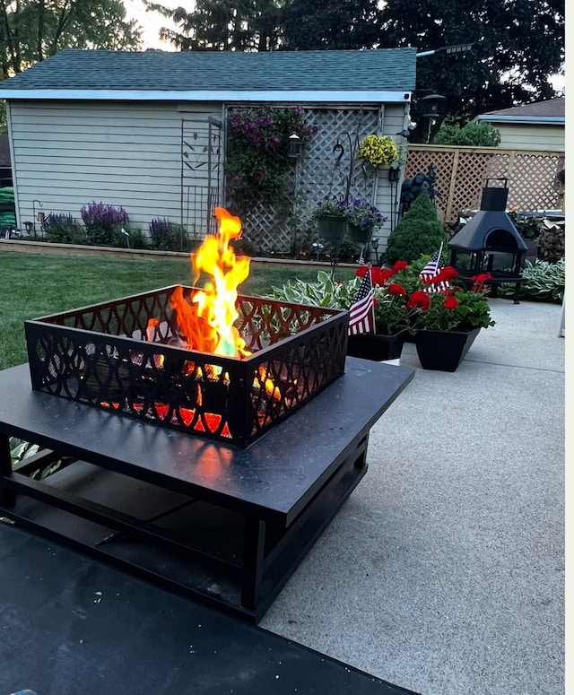 124 N W End Ave, Westmont, IL 60559 - view of patio featuring a fire pit and grilling area