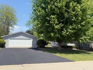528 Ivy Ct, Round Lake Beach, IL 60073 - view of front facade with a garage
