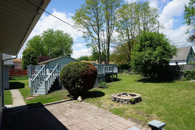 528 Ivy Ct, Round Lake Beach, IL 60073 - view of yard featuring stairway, a fire pit, a patio area, and a deck