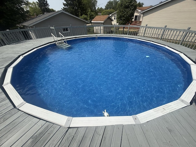 528 Ivy Ct, Round Lake Beach, IL 60073 - view of pool featuring a wooden deck
