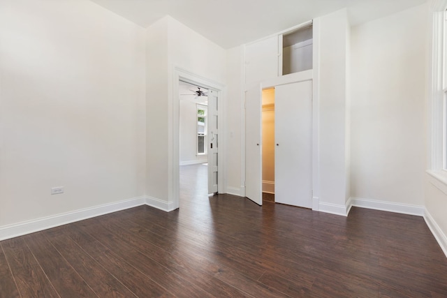 718 Sycamore St, Ottawa, IL 61350 - unfurnished room with dark wood-style floors, baseboards, and a ceiling fan