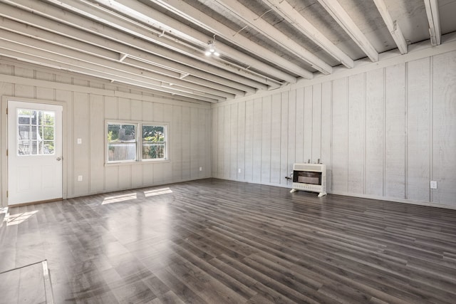 718 Sycamore St, Ottawa, IL 61350 - unfurnished living room featuring heating unit and wood finished floors
