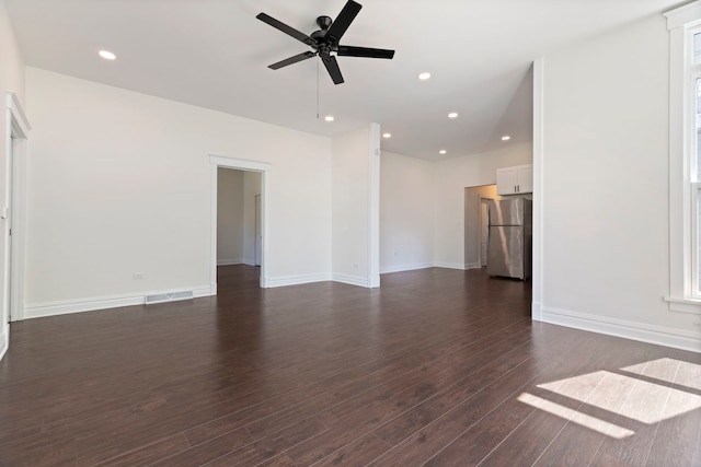 718 Sycamore St, Ottawa, IL 61350 - unfurnished living room with a ceiling fan, dark wood-style flooring, baseboards, and recessed lighting