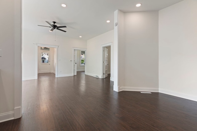 718 Sycamore St, Ottawa, IL 61350 - unfurnished living room featuring a ceiling fan, dark wood-style floors, recessed lighting, and baseboards