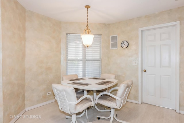 241 Old Oak Ct W, Buffalo Grove, IL 60089 - dining space featuring light wood-type flooring and baseboards