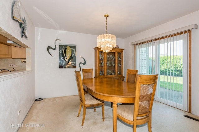 241 Old Oak Ct W, Buffalo Grove, IL 60089 - dining room featuring light colored carpet and a chandelier