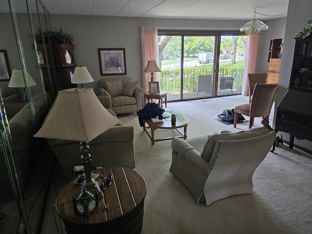 9906 Shady Ln Unit 1Sw, Orland Park, IL 60462 - carpeted living area with a chandelier