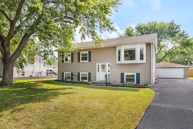 710 Sunset Ln, Shorewood, IL 60404 - split foyer home featuring an outdoor structure and a garage