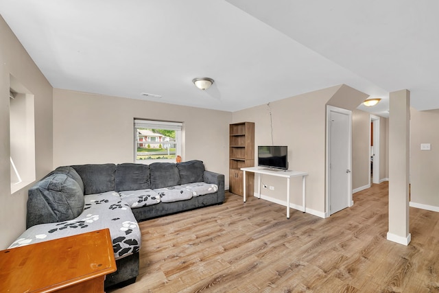 710 Sunset Ln, Shorewood, IL 60404 - living area featuring light wood finished floors and baseboards