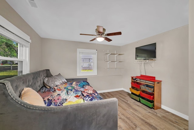 710 Sunset Ln, Shorewood, IL 60404 - living area featuring wood finished floors and ceiling fan