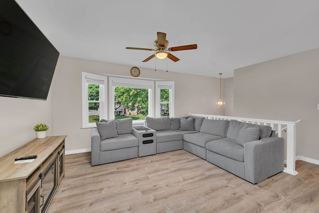 710 Sunset Ln, Shorewood, IL 60404 - living area featuring ceiling fan and light wood-style flooring