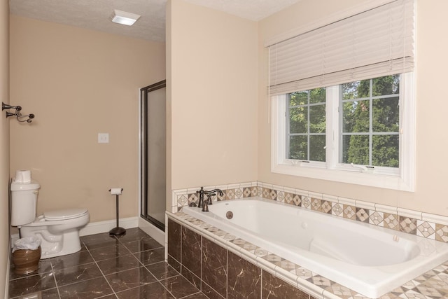 2004 Withers Ln, Bloomington, IL 61704 - bathroom with a bath, a shower stall, and tile patterned floors