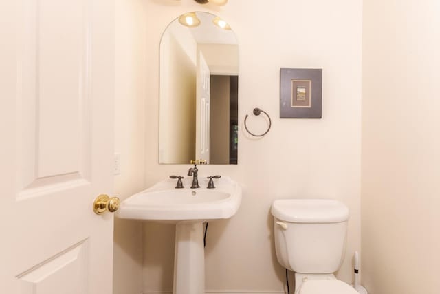 2004 Withers Ln, Bloomington, IL 61704 - half bath with toilet and a sink