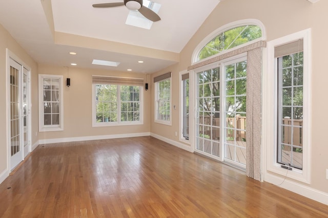 2004 Withers Ln, Bloomington, IL 61704 - unfurnished sunroom with a skylight, french doors, wood finished floors, and lofted ceiling
