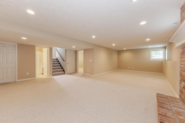 2004 Withers Ln, Bloomington, IL 61704 - basement with stairs, recessed lighting, and light colored carpet