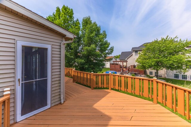 2004 Withers Ln, Bloomington, IL 61704 - wooden deck featuring a residential view
