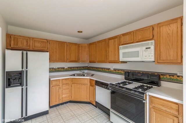 367 S Crown Ct, Palatine, IL 60074 - kitchen with white appliances, a sink, light countertops, and light flooring
