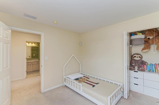 1924 Golden Gate Ln, Naperville, IL 60563 - bedroom with light colored carpet, baseboards, and a closet