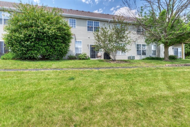 1924 Golden Gate Ln, Naperville, IL 60563 - rear view of property featuring a lawn and central AC