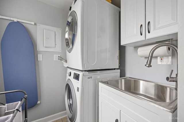 27W314 Melrose Ln, Winfield, IL 60190 - washroom with stacked washer / dryer and cabinet space