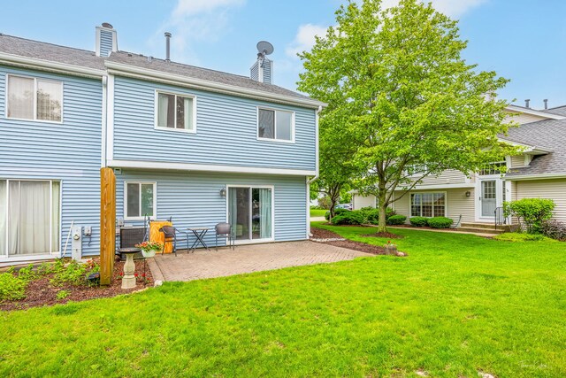 27W314 Melrose Ln, Winfield, IL 60190 - back of house with a patio, a yard, and a chimney
