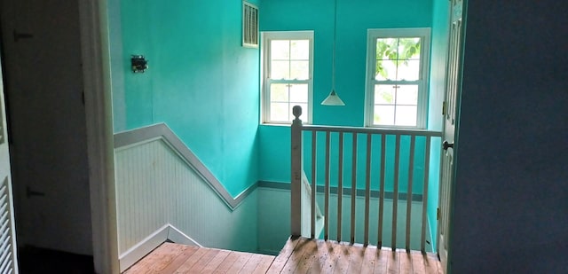 809 S Lynn St, Champaign, IL 61820 - stairway featuring hardwood / wood-style floors