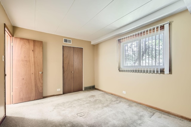 12026 S Kildare Ave Unit 15, Alsip, IL 60803 - unfurnished bedroom featuring carpet, baseboards, and a closet