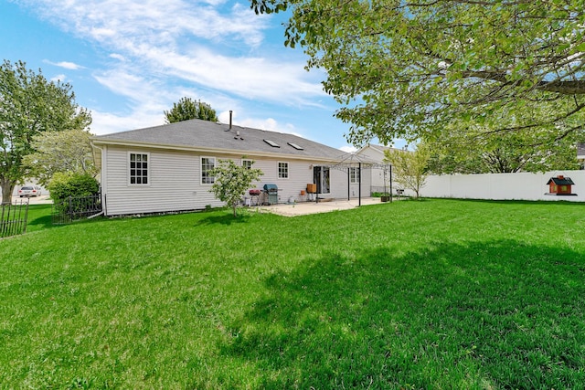 1565 Stefanie Ln, Bourbonnais, IL 60914 - rear view of house with a patio area