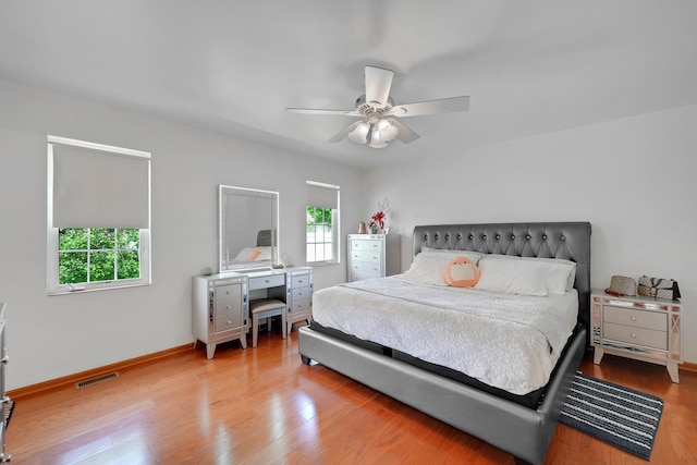 1565 Stefanie Ln, Bourbonnais, IL 60914 - bedroom featuring baseboards, light wood-type flooring, and a ceiling fan