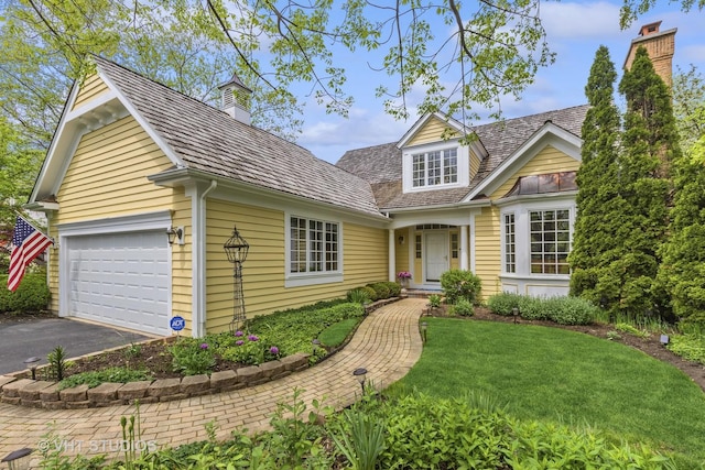 289 S S Shore Ln, Lake Forest, IL 60045 - traditional home featuring a chimney, driveway, and a front yard
