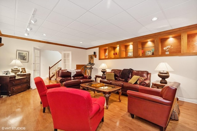 289 S S Shore Ln, Lake Forest, IL 60045 - living room with ornamental molding, light wood-style floors, stairway, and rail lighting