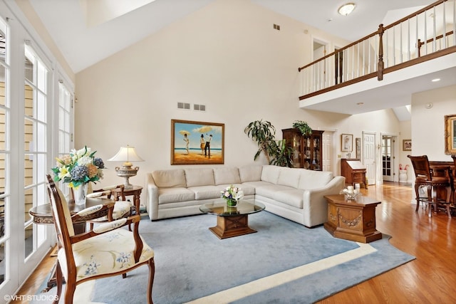 289 S S Shore Ln, Lake Forest, IL 60045 - living room featuring high vaulted ceiling, wood finished floors, and french doors