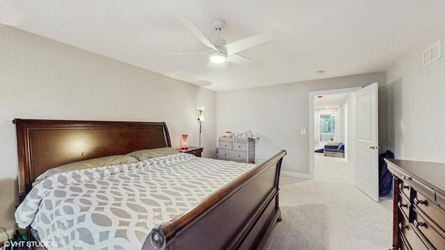532 Ursuline Ave, Naperville, IL 60565 - bedroom with light colored carpet, a ceiling fan, and baseboards