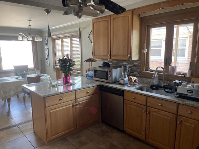 4549 N Canfield Ave, Norridge, IL 60706 - kitchen featuring stainless steel appliances, a sink, a peninsula, crown molding, and light stone countertops