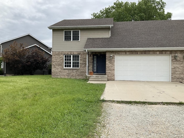 934 Evans St, Ottawa, IL 61350 - view of front of house featuring concrete driveway, brick siding, a front yard, and an attached garage