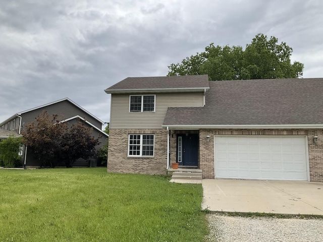 934 Evans St, Ottawa, IL 61350 - view of front of house featuring brick siding, driveway, a front lawn, a garage, and roof with shingles