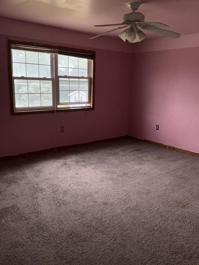 934 Evans St, Ottawa, IL 61350 - carpeted spare room featuring ceiling fan and baseboards