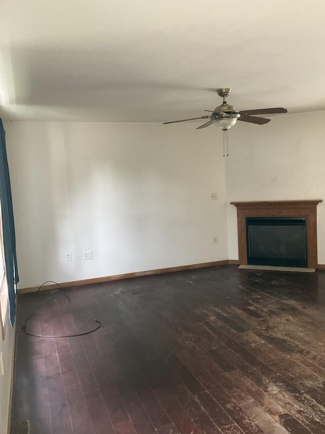 934 Evans St, Ottawa, IL 61350 - unfurnished living room with hardwood / wood-style flooring, a ceiling fan, a fireplace, and baseboards