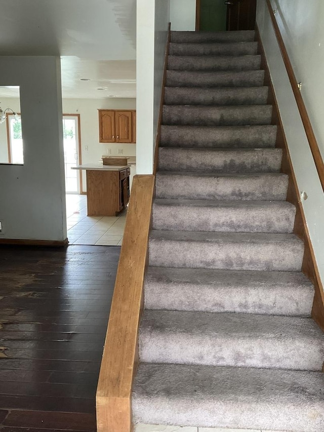 934 Evans St, Ottawa, IL 61350 - stairs featuring hardwood / wood-style flooring and baseboards