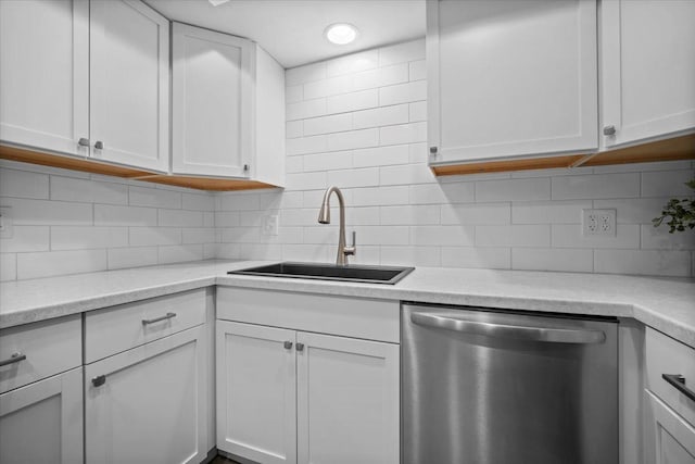 824 Mcgregor St Unit 4, Bloomington, IL 61701 - kitchen with dishwasher, white cabinets, light countertops, and tasteful backsplash