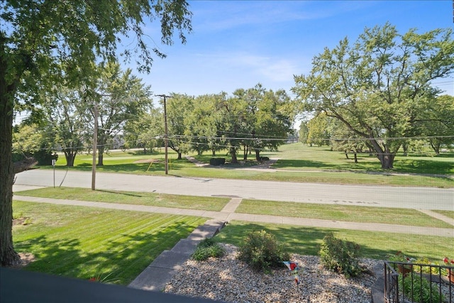 824 Mcgregor St Unit 4, Bloomington, IL 61701 - view of property's community with a lawn and view of wooded area